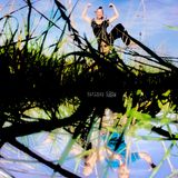 Suetszu and jayrope hopping around surrounded by high gras